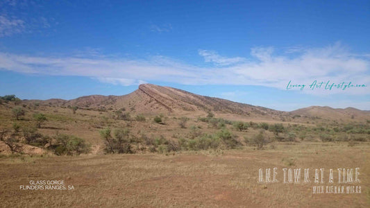 UFO Disk shaped Red dirt mountain in Outback South Australia dirt road in Glass Gorge, Flinders Ranges, South Australia. Desoloute scene